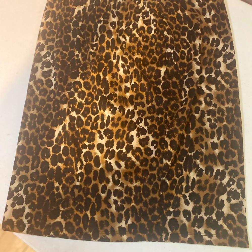 Leopard print pencil skirt with elastic waist band.